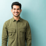 happy man standing against isolated background